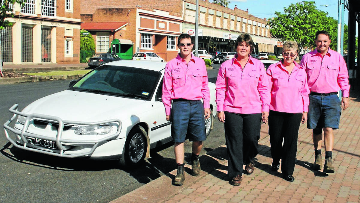 GOING PINK: Tamworth Regional Council Manilla-based staff trainee water operator Brad Laws, left, customer service officer Belinda Laws, citizen services co-ordinator Robyn Fletcher and water team leader , Bill Constable preparing to be in the pink from October 2.