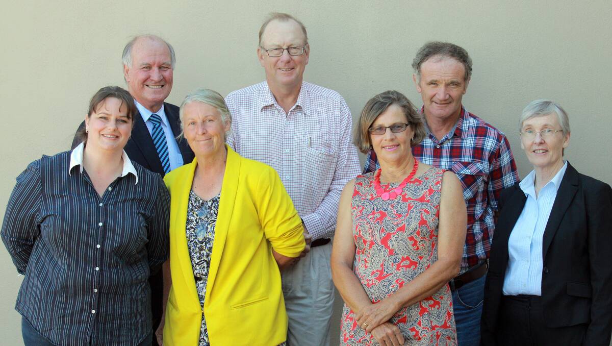 LEARNING CURVE: Graduates from left, Fiona Kirby, Rhonda Kelson, Craig Carter, Sue Webb, Bill Morgan and Kathy Sims with MP Tony Windsor, back left. Photo: Robert Chappel 280312RCB01