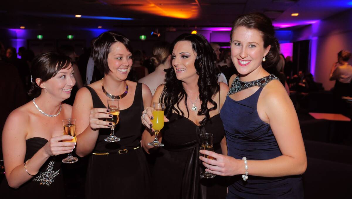 Renae Galea, Hayley Dunst and Alitia Upchurch from the Telstra Tamworth Business Centre and Karly Davidson from Edwards O'Conner Chartered Accountants at the Quality Business Awards held at TRECC on Friday night. Photo: Robert Chappel