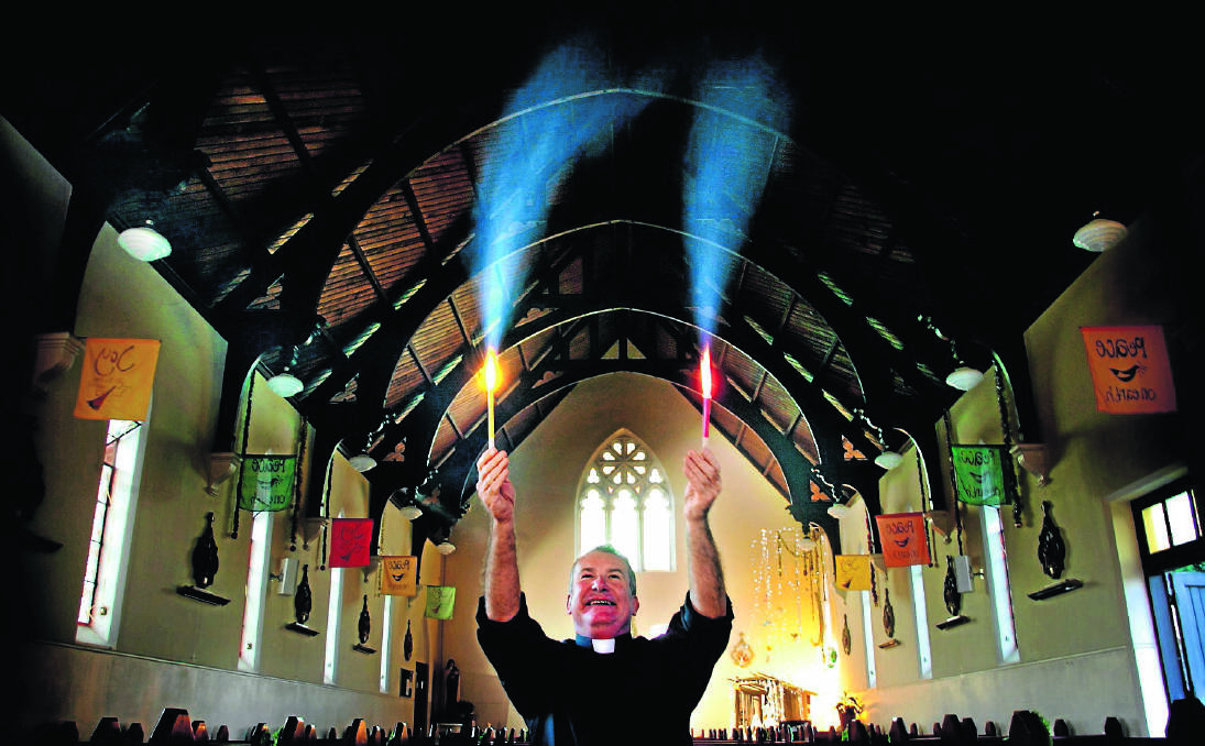 WITH A BANG: Guyra Catholic priest Father Anthony Koppman will deliver another spectacular display of New Year’s Eve fireworks in Armidale tonight. The event is one of many being held across the region to see in 2014. Photo: Kitty Hill