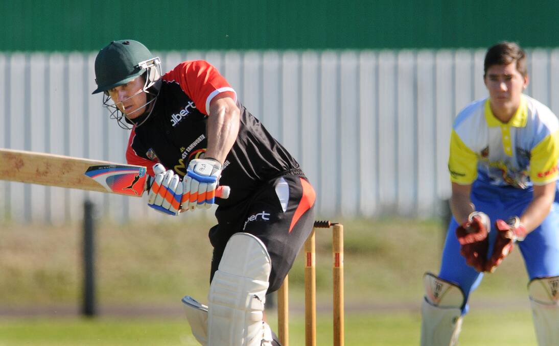 The Albert skipper Adam Jones scored a quickfire 70 last night, an innings which might have helped his side into the January 10 McDonald’s T20 Final. Wicketkeeper is Campbell Baker.  Photo: Gareth Gardner  201213GGD02