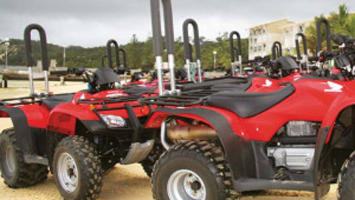 Quad bikes fitted with rollover bars.