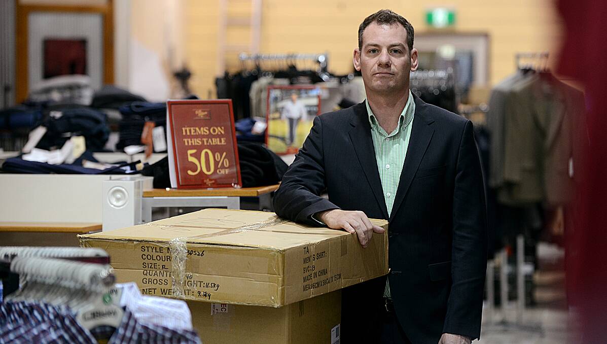 FAMILY BUSINESS FOR  SALE:  Company owner Brendon Blowes in The Wardrobe store on Peel St. Photo: Barry Smith 290713BSG01
