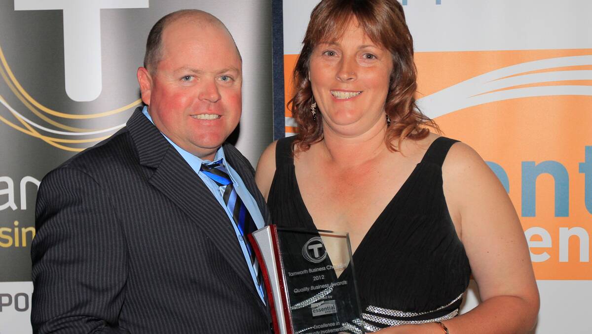 Winners of Excellence in Community Involvement/Service Easters Landscape, Trevor Whitney and Janene at the Quality Business Awards held at TRECC on Friday night. Photo: Robert Chappel