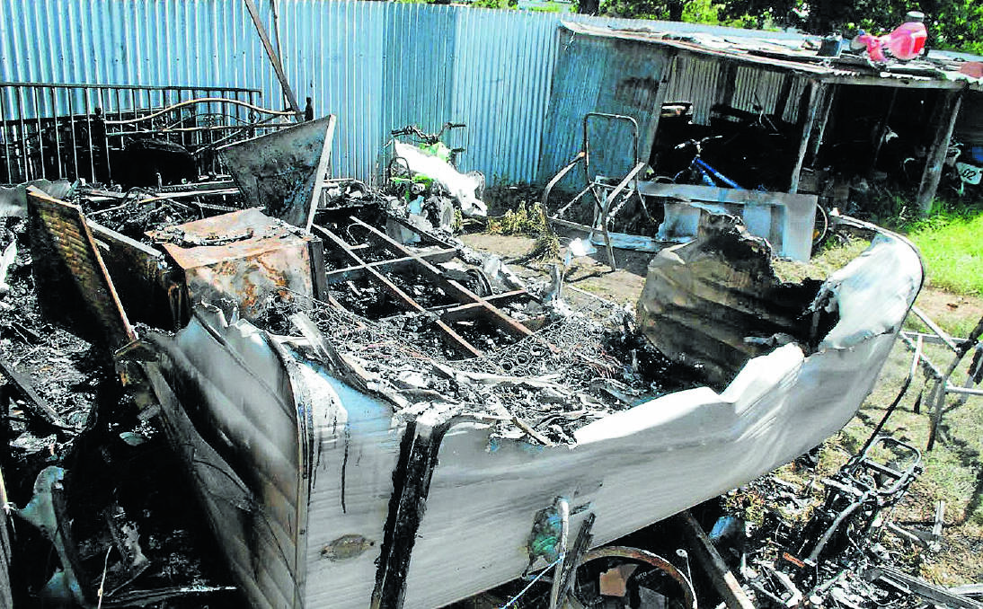 NOTHING LEFT: The remains of the burnt-out caravan were barely recognisable in the rear of the Manners St home following the fatal fire. Photo: Tenterfield Star