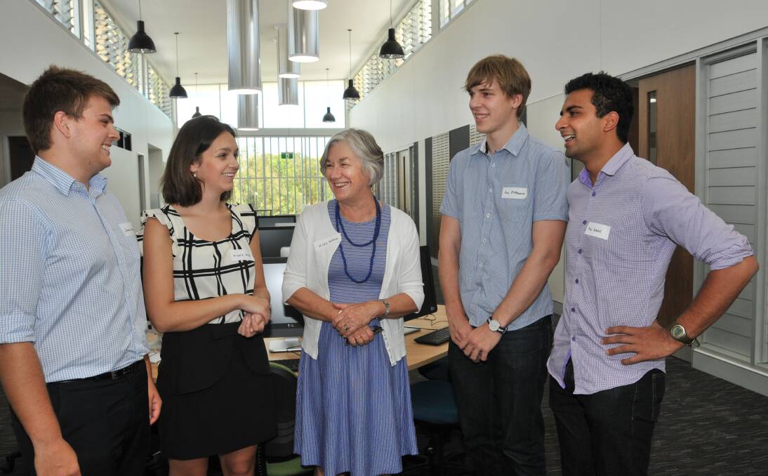 MODERN MEDICINE: Newcastle medical students James Wayte, Nicola Wood, Zac McPherson and Nas Abdul are given a tour of the top level of the new-look Tamworth Education Centre by Professor Nicky Hudson, centre. Photo: Geoff O’Neill 050214GOE01