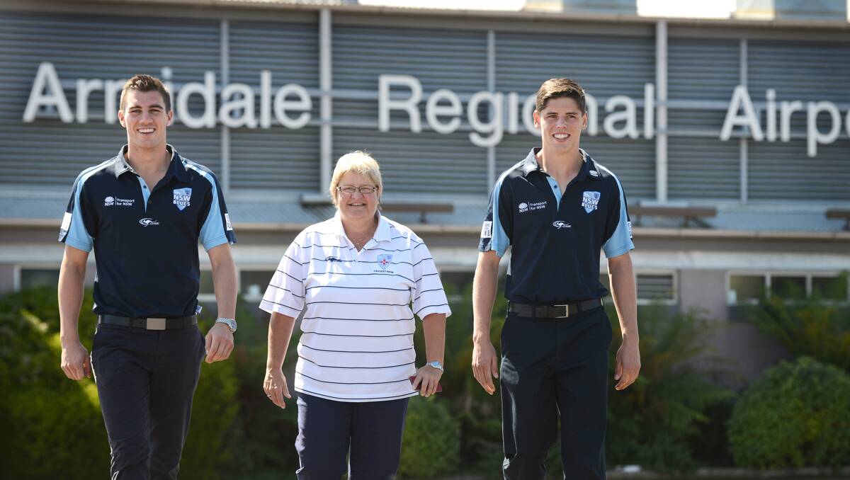 NSW Test cricketers Pat Cummins and Ben Dwarshuis were met at the airport by Central Northern zone development manager Kath Barber to get the whirlwind tour under way.   Photo: Barry Smith  040913BSB06
