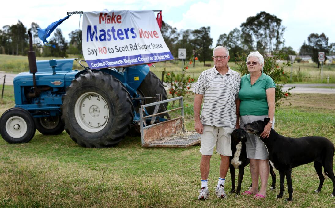 GETTING TRACTION: Jack and Barbara York have put some more horsepower into their protest over rezoning applications that will open the way for Masters to build on a cross- city paddock and on the edge of a floodplain. Photo: Barry Smith 161213BSC01 