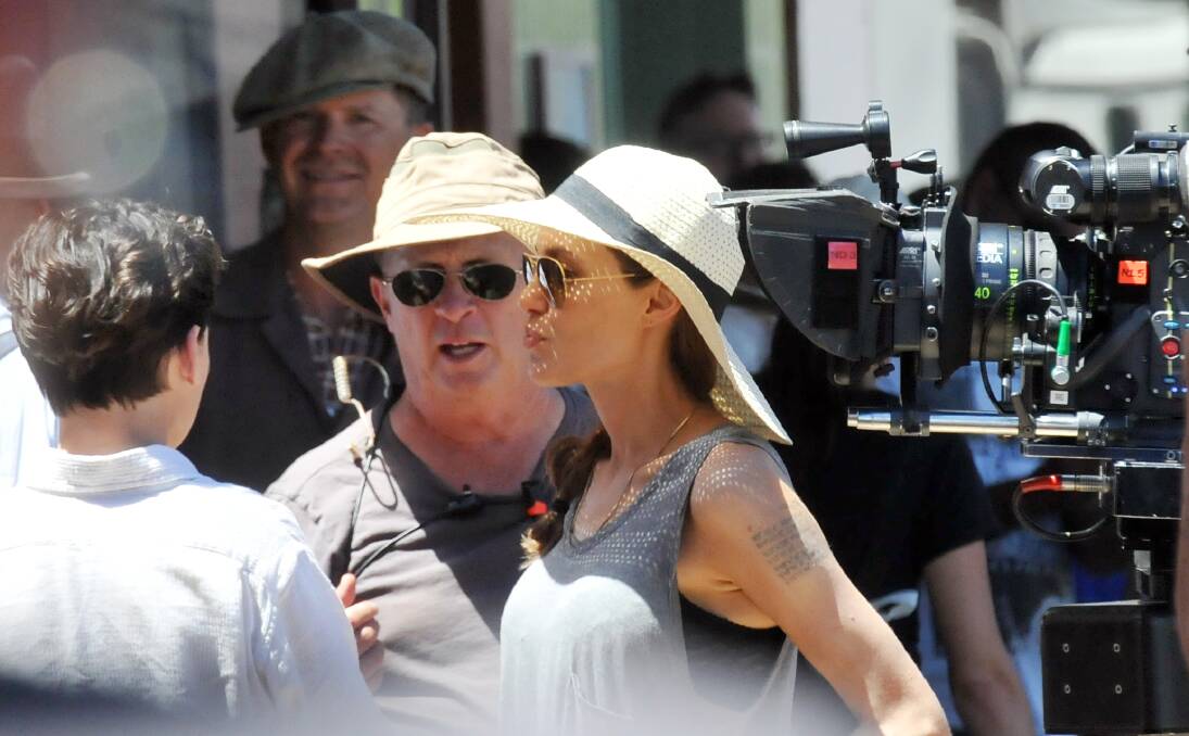 CLASS ACT: Angelina Jolie on the set of her latest film Unbroken at Werris Creek. Photo: Geoff O’Neill 121213GOA27