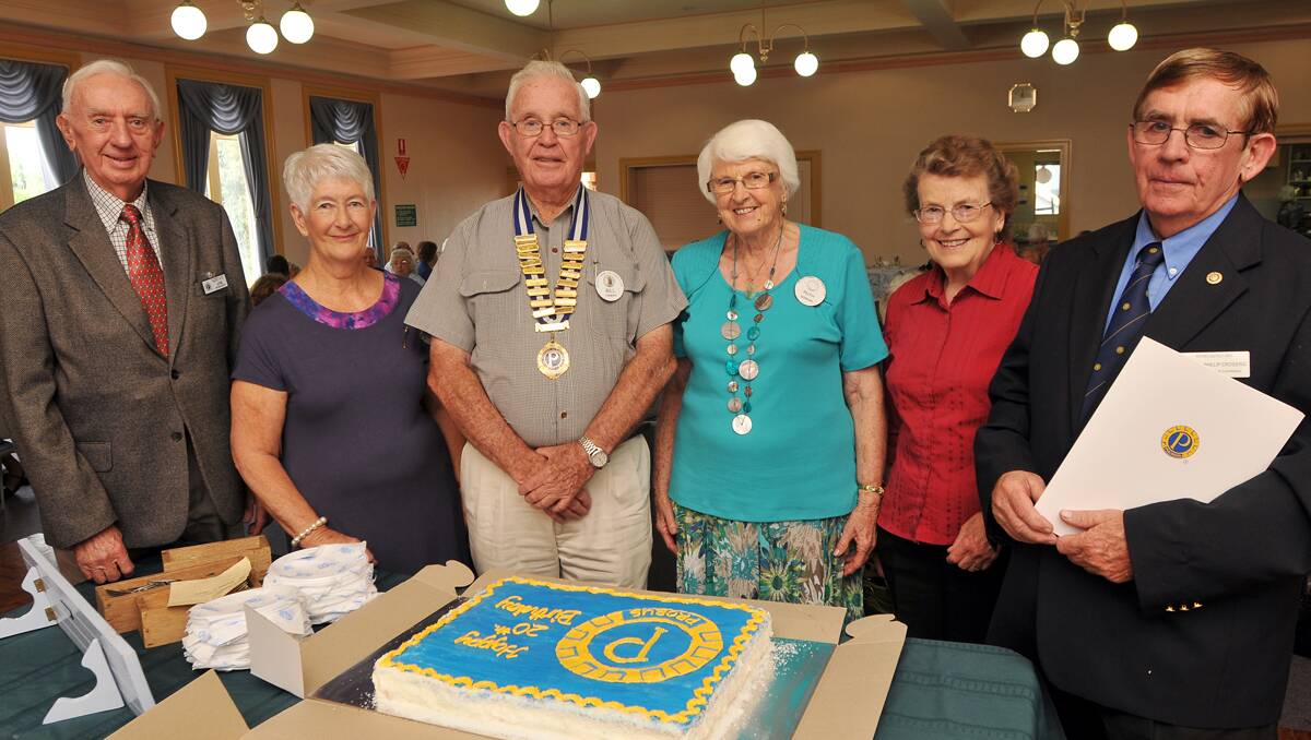 MILESTONE: From left, Jim Moriarty from Tamworth Men’s Probus Club, Marie de Groot from Peel Combined Probus Club, incoming president Bill Firman, outgoing president Ruth Gordon, Elizabeth Hingston from Tamworth Combined Probus Club and Rotary district chairman for Probus, Phillip Crossing. 120312GOA01