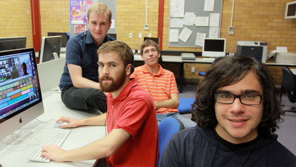 CREATIVE CLIPS: TAFE’s diploma of interactive digital media students, including, left to right, Best Animation category winner Daniel Garner, Vincent O’Connor, Bart Riley and Peter Simon. Photo: Robert Chappel 311012RCB03