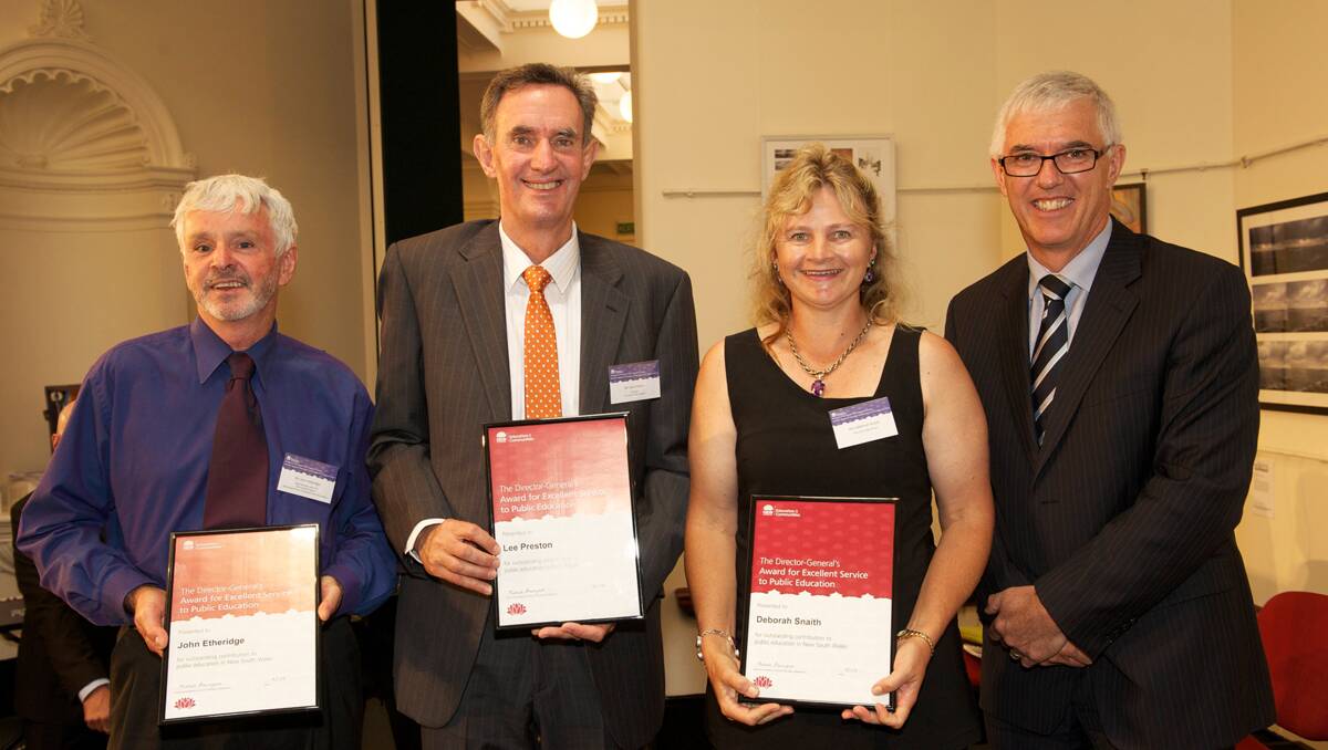 COMMITMENT APPRECIATED: From left, New England public schooling region asset manager John Etheridge, Tamworth Public School principal Lee Preston, Macintyre High School head agriculture teacher Deborah Snaith with school education director for the New England Central region, Phil Jones, after the presentation of their Director-General of Education Awards in Sydney on Tuesday.