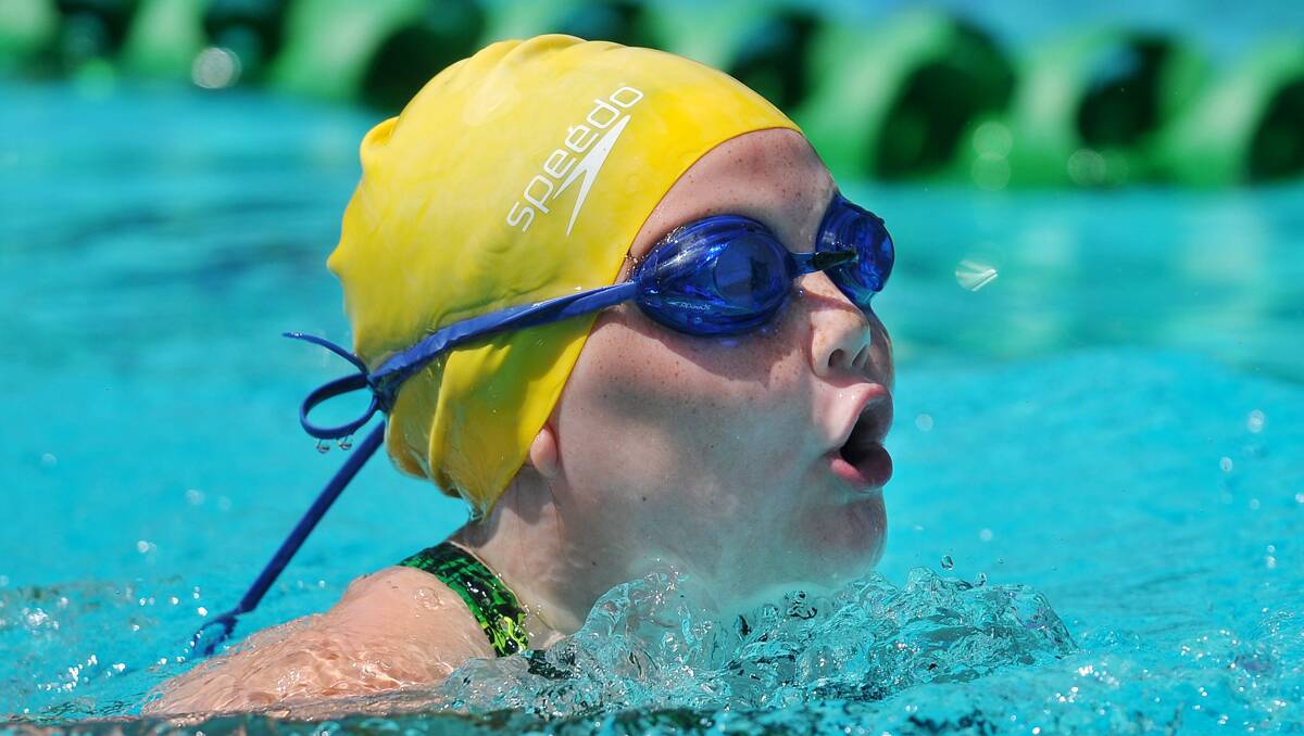Manilla’s Molly Purtle is only six but finished in the top three in several of her 7 and under events, including the 25m  breaststroke. 161212GRA52