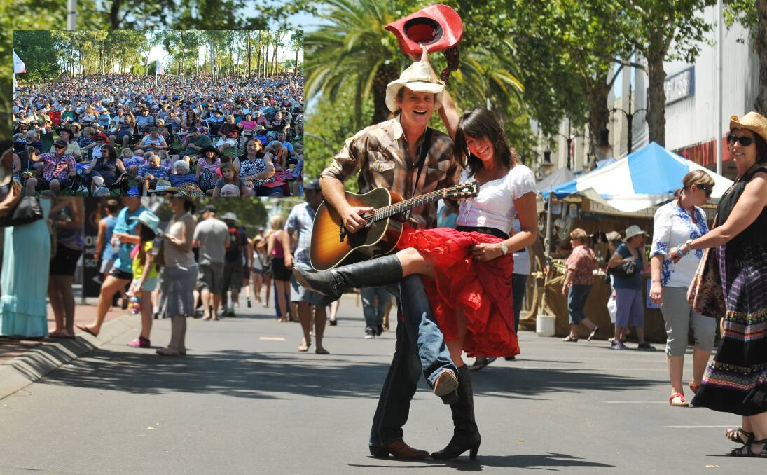 HATS OFF: Rod and Shelly Dowsett get into the spirit of things as they enjoy the festive atmosphere along Peel St yesterday.  Photo: Geoff O’Neill 190114GOD05. INSET: About 11,000 fans gathered for the festival’s opening concert.