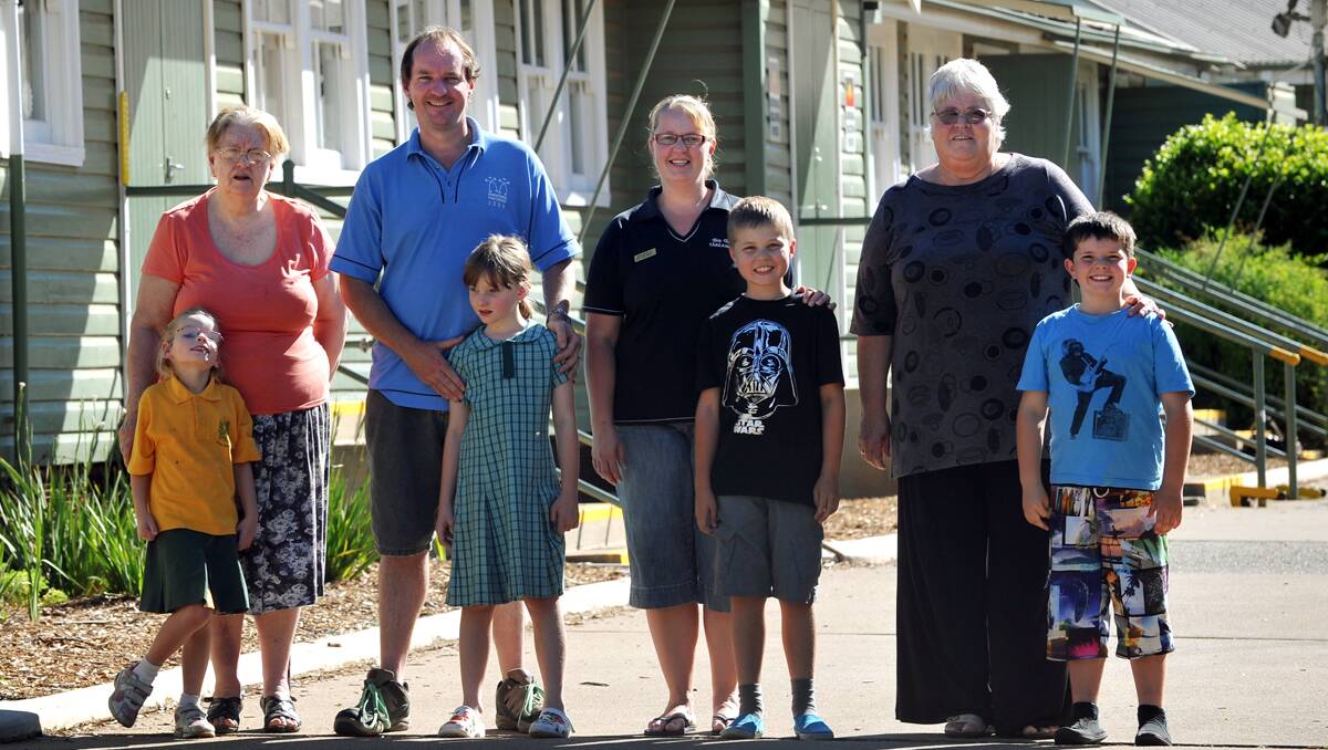 Long history: Three  generations of the Bailey and Alderson clans have attended Tamworth South. From left are Elizabeth Bailey, her  granddaughter Tamika, 6, her son David and granddaughter Katelyn, 8, Amanda Jones, her son Hayden Alderson, 9, grandmother Ellen Alderson and her other son Connor Alderson, 8. Photo: Barry Smith  021112BSE02