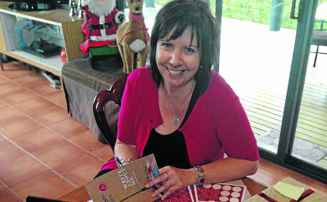 THE WRITE STUFF: Former Quirindi woman Melissa Pouliot signs copies of her hugely successful debut novel, Write About Me. The book is based on the 1987 disappearance of Ms Pouliot’s cousin, Quirindi teenager Ursula Barwick.