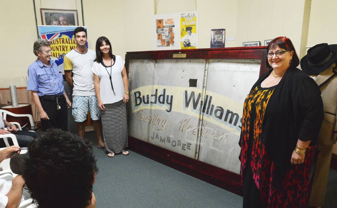 MEMORIES: Australian Country Music Hall of Fame president Eric Scott with Buddy Williams’ great-grandson Caydan Wickham, granddaughter Corinne Wickham and daughter Karen Williams, who unveiled Buddy’s touring canopy. Photo: Barry Smith 150114BSH02