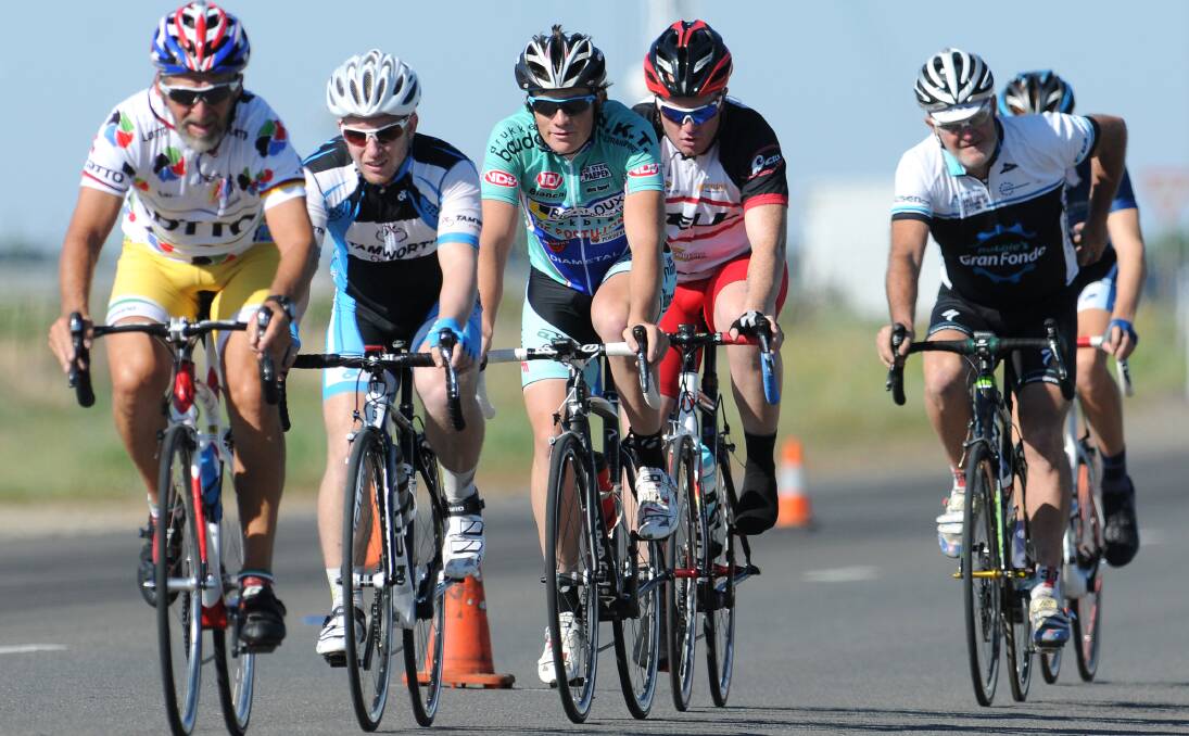  Alan Spokes leads out in a recent B Grade crit from Brad Roberts. The veteran finished  second to Jack Pianta that day and second again to Brendan Hallford on Sunday.  Photo: Barry Smith 151213BSA02