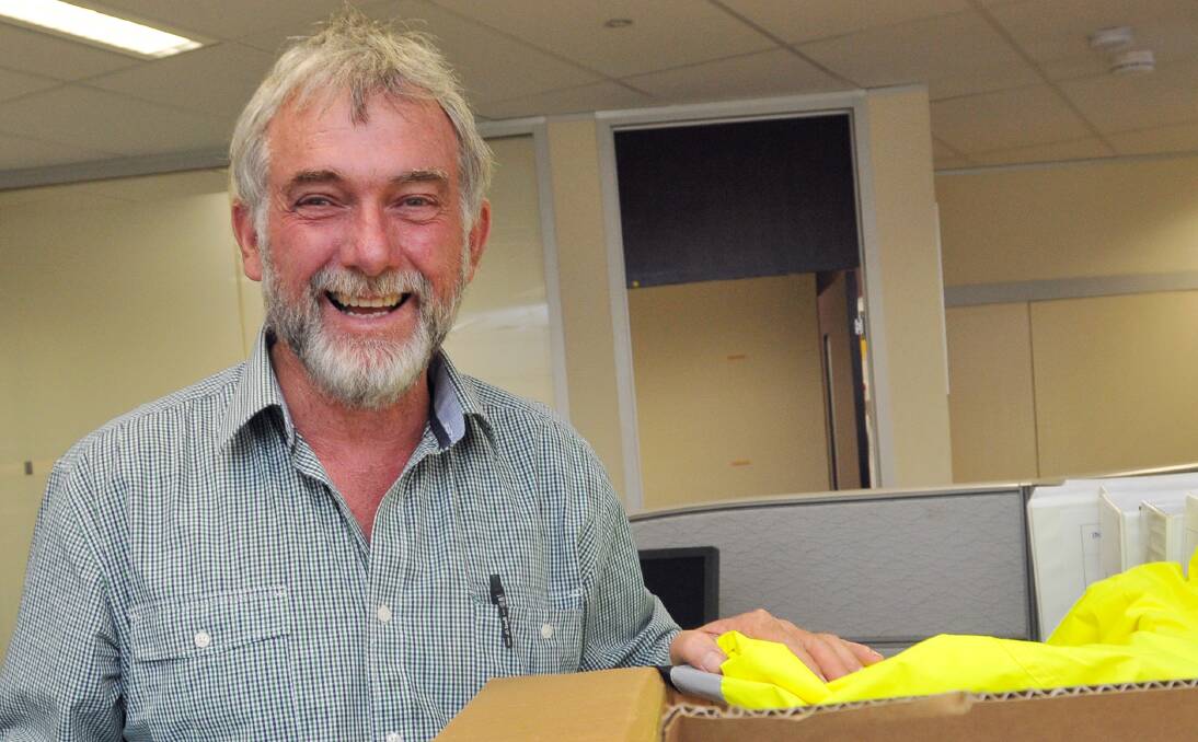 CALLING IT A DAY: Russell Webb on his last day at WorkCover. Photo: Geoff O’Neill 061213GOB01