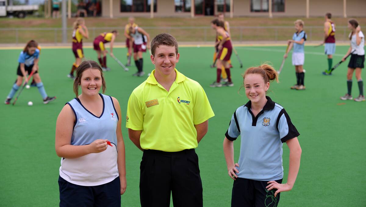 Preparing to referee City-Country hockey are, from left, Gabbi D’Ambros, Jake Sheppeard and Sarah Willis. Photo: Barry Smith  260213BSF04