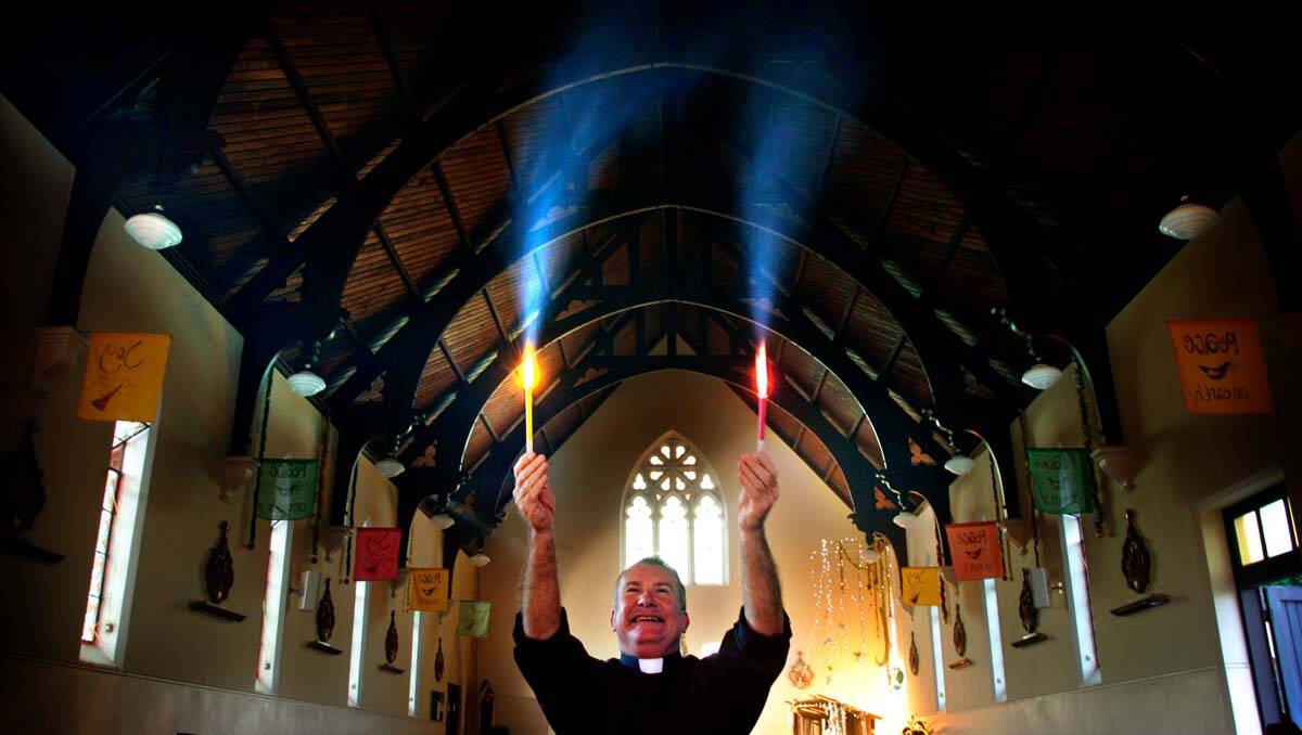 Father Anthony Koppman is known as Father Holy Smokes for his famous pyrotechnics displays. Photo: Kitty Hill