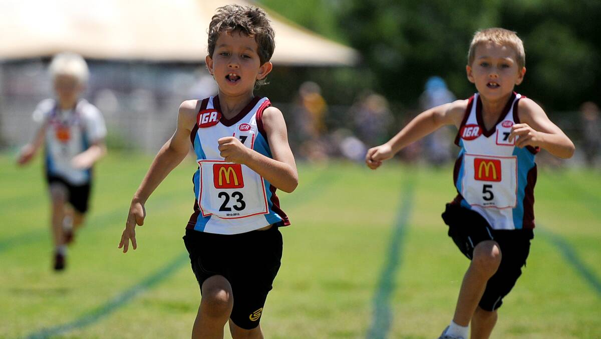 Inverell duo Max Cracknell (left) and Damon Murphy finish one-two in this seven years 100m heat. 181112GRB38
