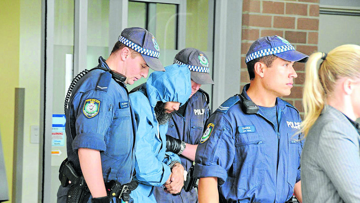 CHILLING: Malcolm Naden on the day of his arrest last year. Photo: Fairfax