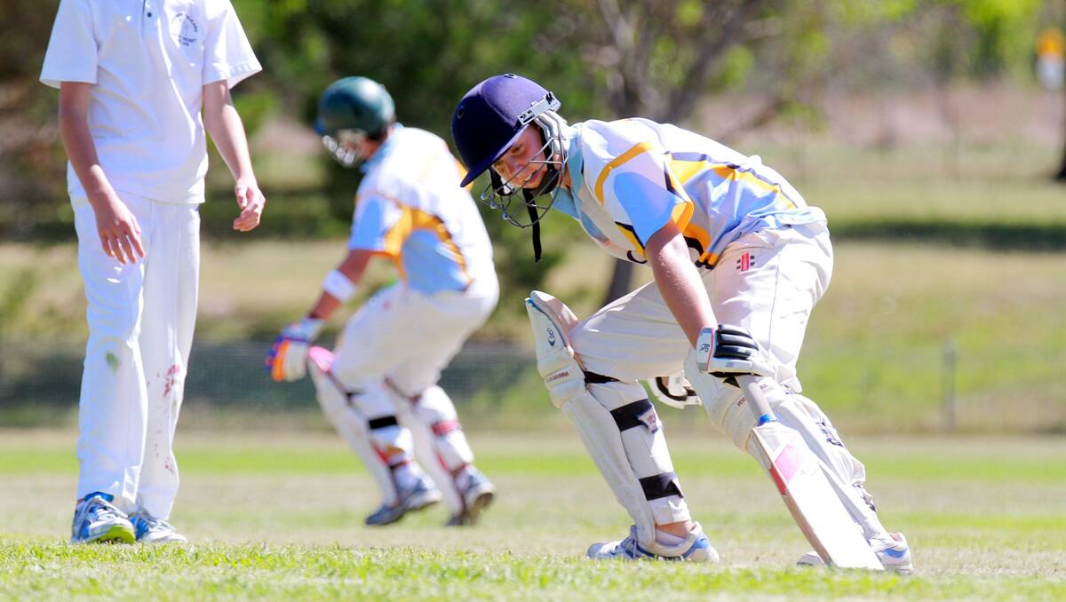 Lachlan Cooke took 5-11 with his leg spin and scored the winning runs for Tamworth in their Walter Taylor Shield win yesterday. Here he and Gavin Austin (background) take a crucial run. Photo: Robert Chappel 070113RCB01083