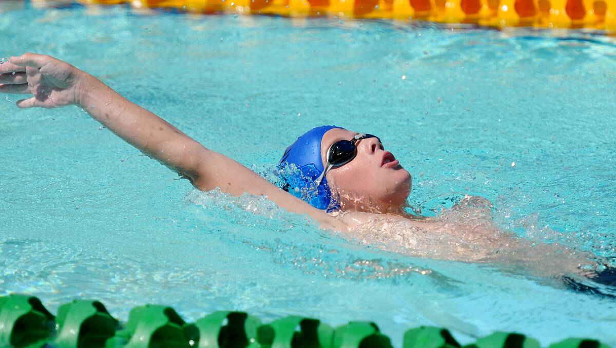 Gunnedah South’s Jackson Carr competes at the Gunnedah Long Course Swimming Carnival back in December. Today he is one of a large team of NW students selected to compete in the State PSSA carnival in Sydney.  Photo:  Grant Robertson 161212GRA24