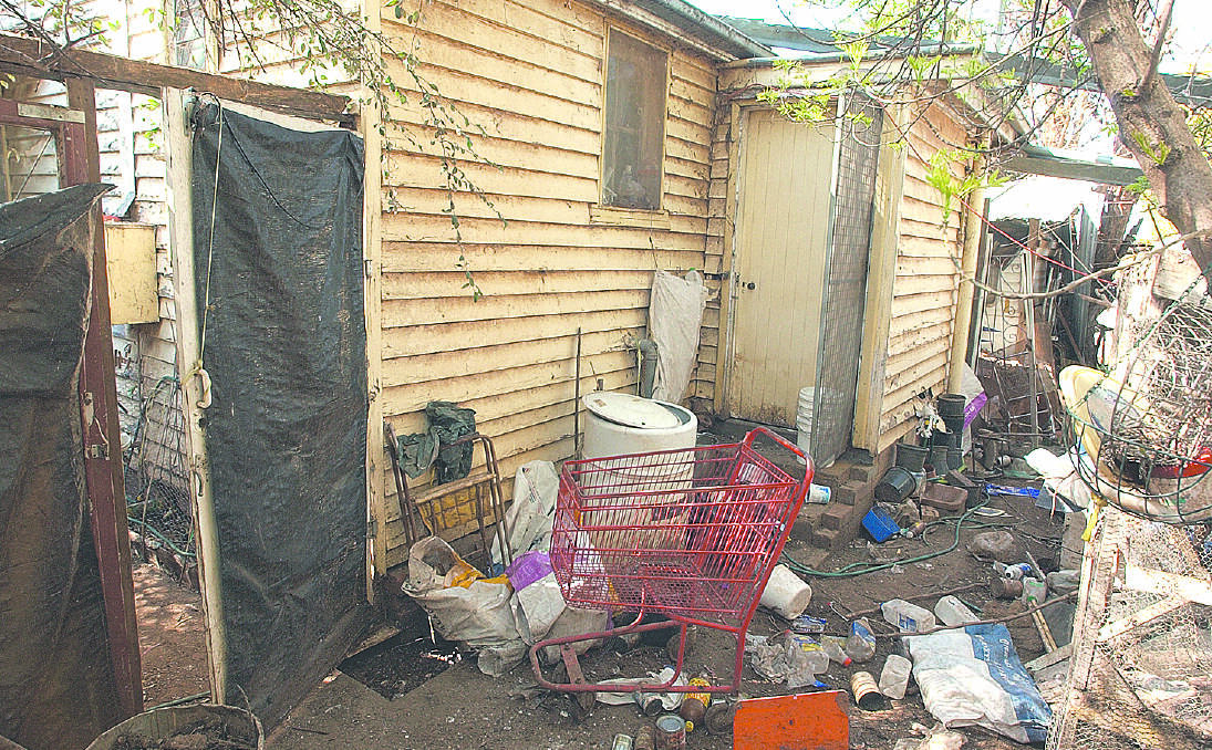 SEIZED: The yard at Florence Vorhauer’s Wilburtree St property where hundreds of chooks and ducks also roamed. The council subsequently seized and cleared the block before selling it at auction. Photo: Barry Smith