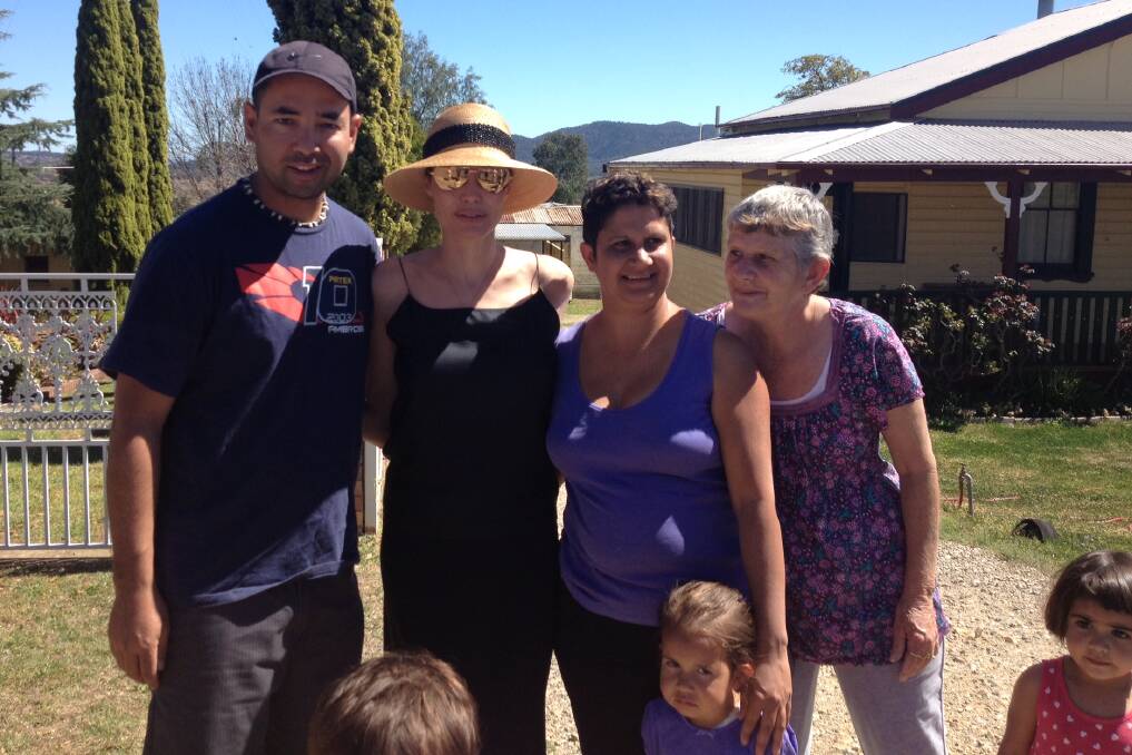 Hollywood superstar Angelina Jolie was only too happy to chat and pose with locals in Werris Creek. Pic: John Wooderson