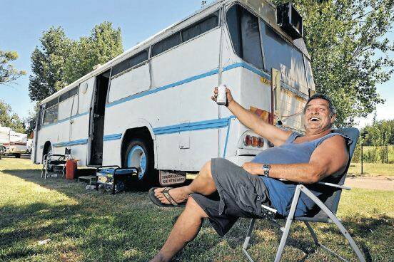 KICK BACK: Wayne ‘Waylon’ Jennings with his camping bus is all ready for this year’s Country Music Festival. Photos: Barry Smith