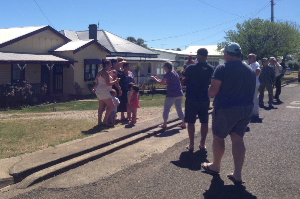 Hollywood superstar Angelina Jolie was only too happy to chat and pose with locals in Werris Creek. Pic: Haley Sheridan