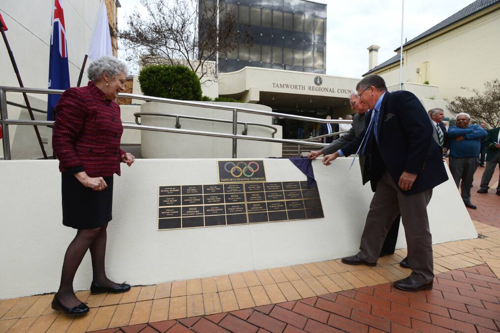Australian Olympic Committee vice president Helen Brownlee with mayor Col Murray and local committee chair Ron Surtees unveil the new wall of honour.