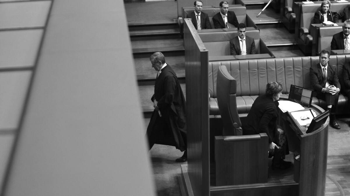 Fomer Speaker Peter Slipper leaves the House of Representatives after resigning as Speaker at Parliament House in Canberra on Tuesday 9 October 2012. Photo: Andrew M