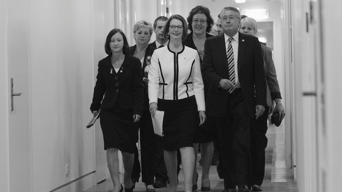 Prime Minister Julia Gillard walks towards caucus for the leadership ballot, at Parliament House in Canberra on Thursday 21 March 2013. Photo: Alex Ellinghausen