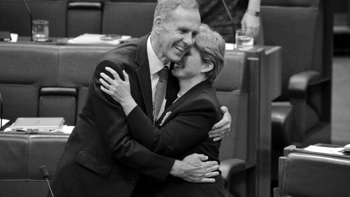Greens Leader Senator Bob Brown embraces Deputy Greens Leader Senator Christine Milne after the Carbon Tax Bills passed the Senate at Parliament House Canberra on Tuesday 8 November 2011. Photo: Andrew Meares