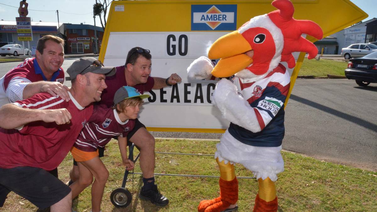  Manly supporters from Amber Tiles, Brian Doorey, Iain Bell, and Ryan and Matt Horton about to take on die-hard Roosters supporter Kevin Moore.