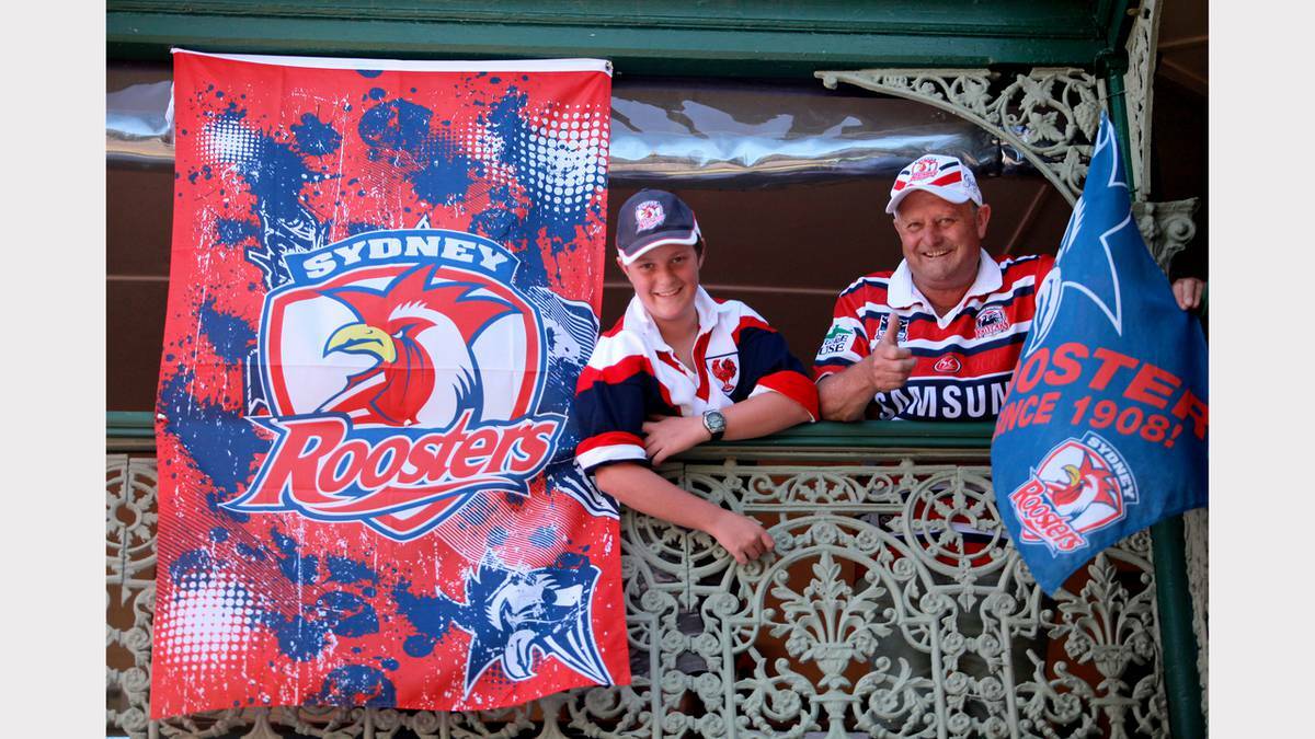 Sydney Roosters fans James and Tony Durham at Armidale's Railway Hotel before heading to Sydney.