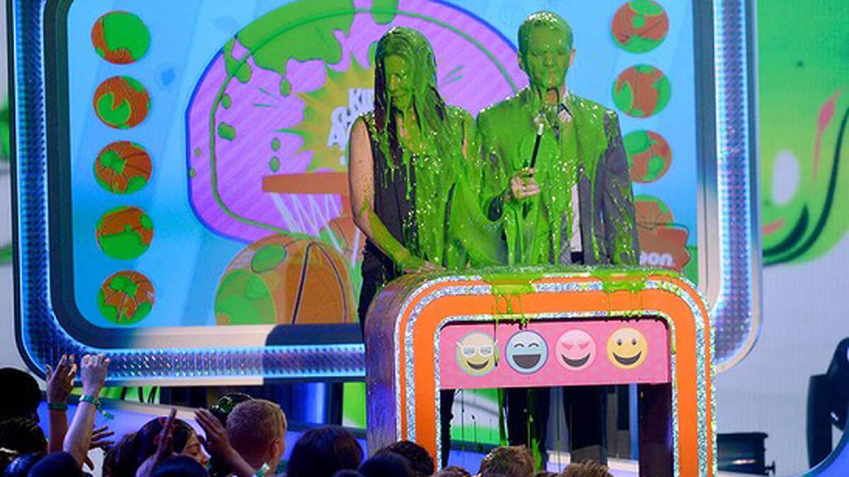 Actors Sandra Bullock and Neil Patrick Harris get slimed. Photo: Getty Images