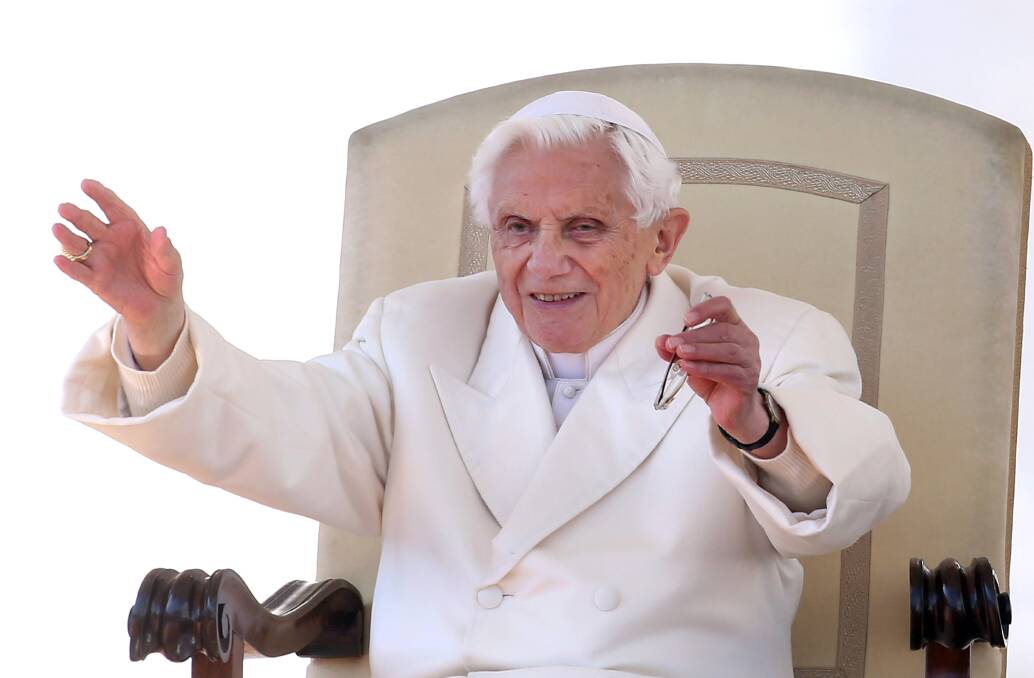 Pope Benedict XVI waves to the faithful gathered in St. Peter's Squareduring his final general audience in Vatican City. Photo by Franco Origlia/Getty Images