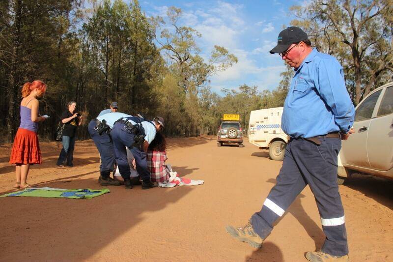 TWO woman in their 40s have been arrested this morning after attempting to prevent a convoy of trucks carrying coal seam gas drilling equipment gaining access to the Pilliga.