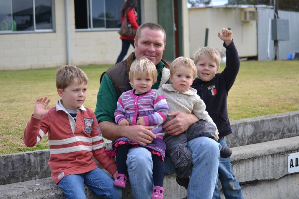 Rugby Union fans: Charlie, Alice, Ben and George with their dad, Spike Wall. Photo:The Inverell Times