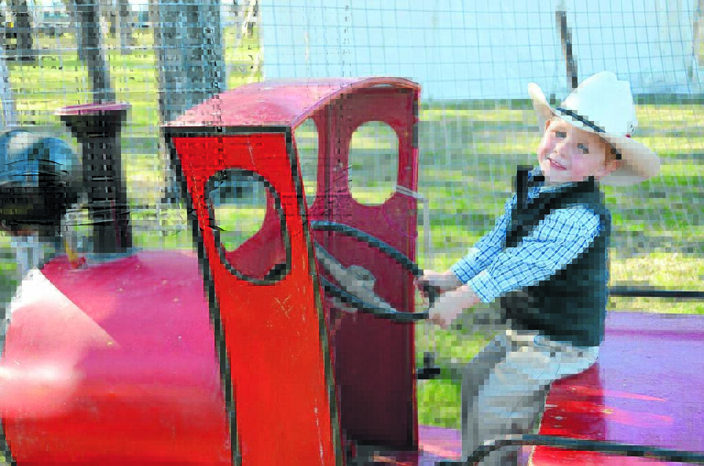 Fletcher Wilby (3) of Gunnedah was most impressed with the children's train rides at Wean. Photo: Ashley Gardner, Namoi Valley Independent. 