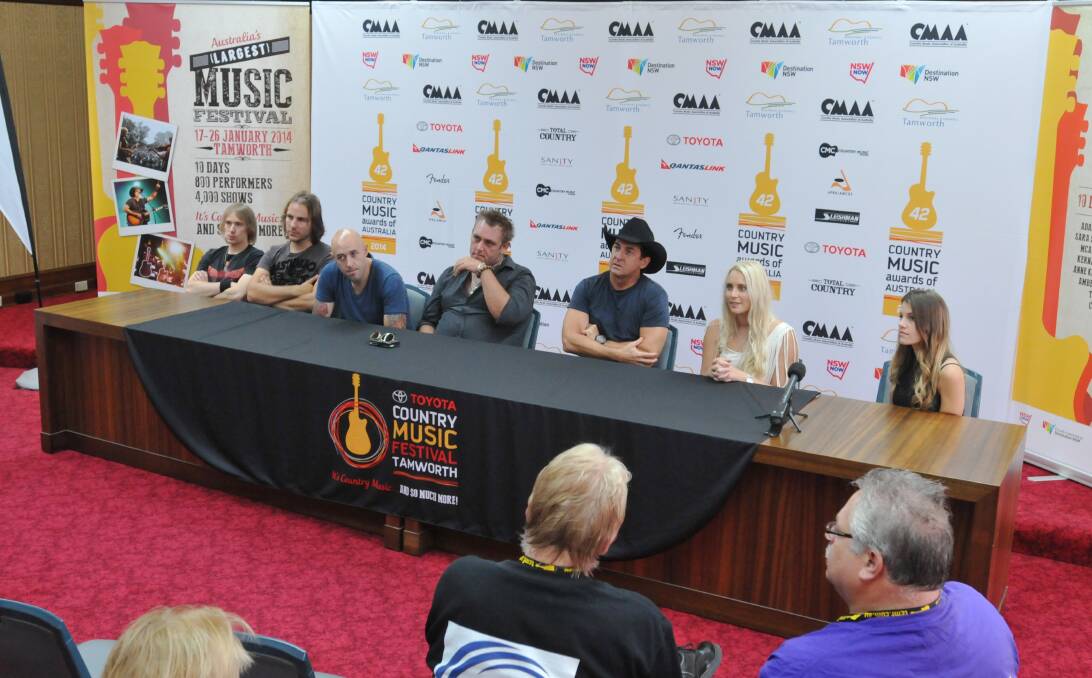 Country artists line up at the daily Country Music media call. Photo: Geoff O'Neill 230114GOB21