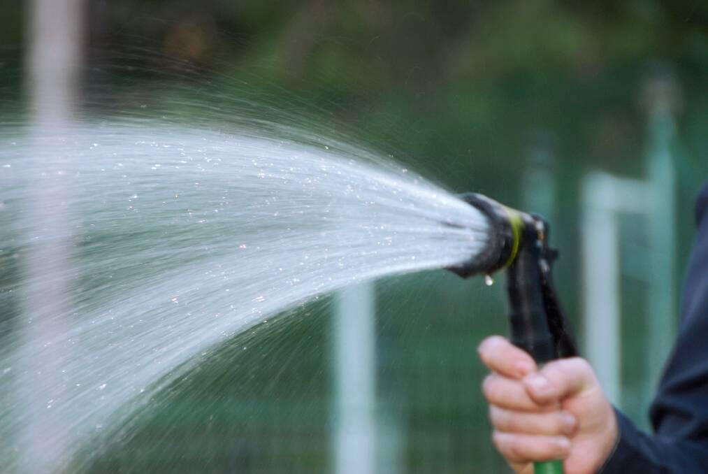 AS THE drought bites more farmers, Tamworth town water users are set to be slugged with tough new outside watering rules within two weeks. 