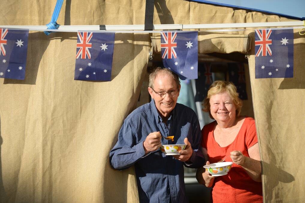 Dennis Parfitt and Betty McTaggart from Brisbane enjoy breakfast at the Riverside camping grounds. Photo:Barry Smith 200114BSA10