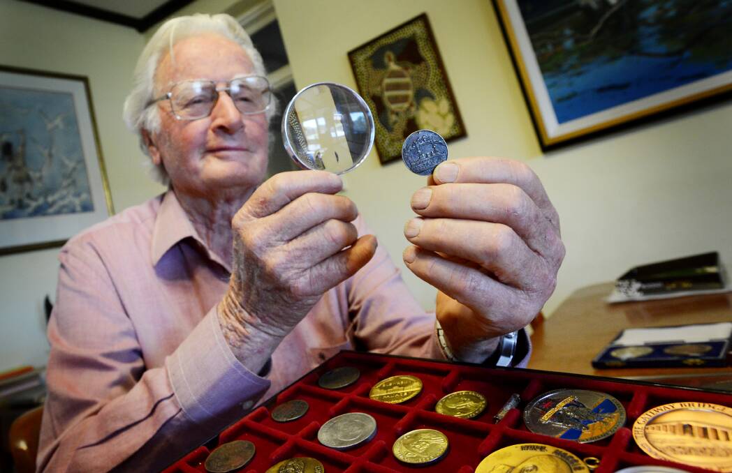 Cliff Hathway with valuable coins in September. Photo:Gareth Gardner 270913GGE01