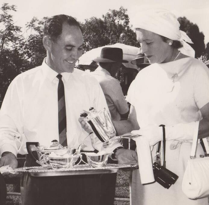 On a plate: John Picone presents a trophy at Moree races in the late 1960s. 