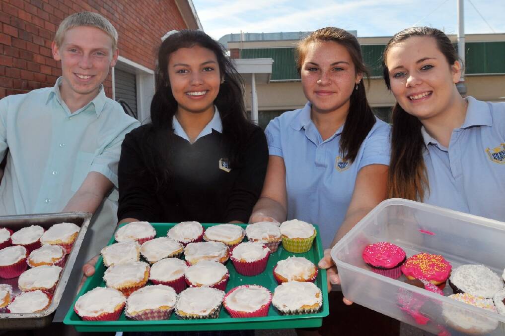 Jamie McGuire, Ruby Williams, Shenae Andrews and Montana Jones at the Tamworth High School cake stall. Photo:Geoff O'Neill.